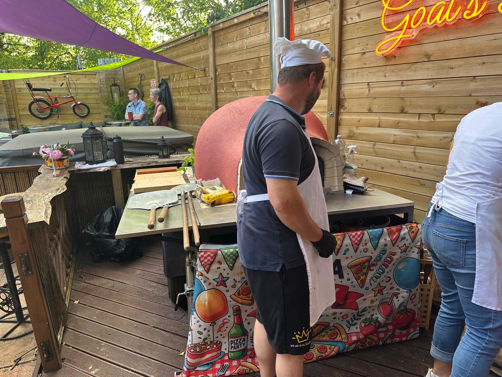Peter at the wood-fired oven during Andy's 60th
