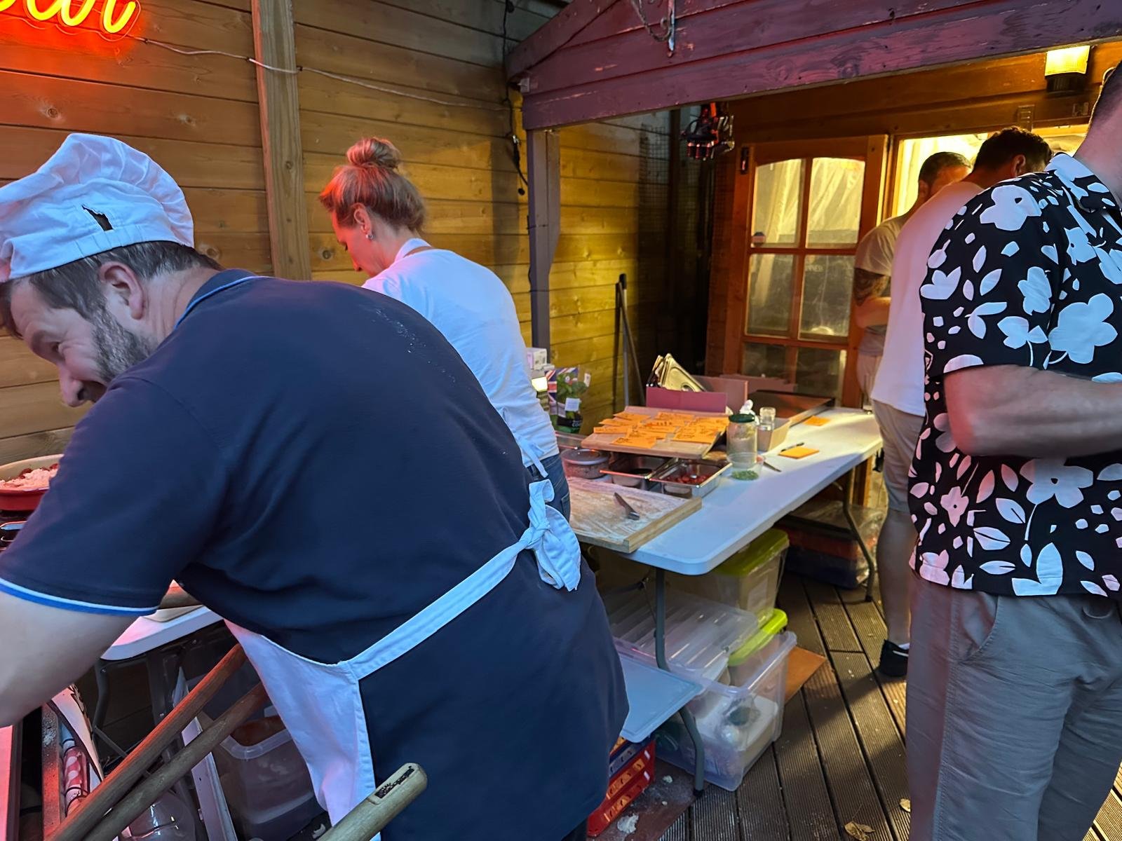 Warm evening pizza prep with the team